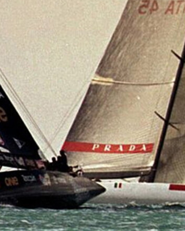Caravela Luna Rossa and its team overtaking the opposing team during competition.